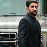 Rohit beside his detailed SUV